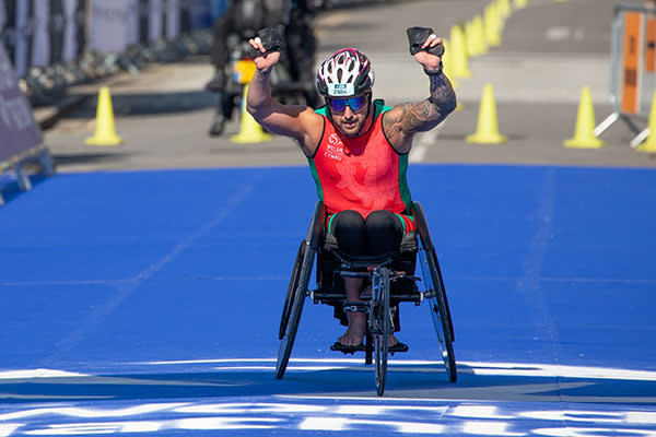 Darren Williams winning a race in his racing wheelchair.