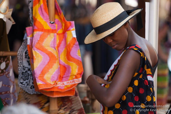 woman shopping for colorful handbags on Church Street