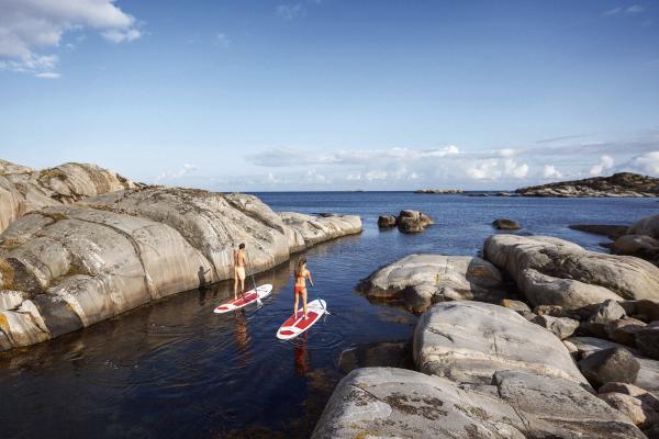 SUP paddling at the coastline of Blindleia in southernmost Norway