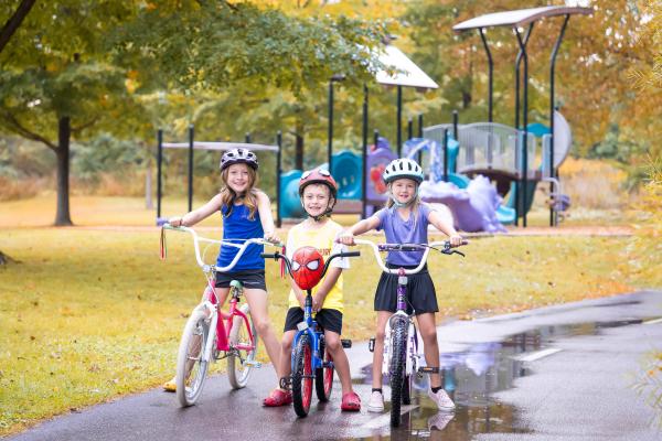 Young bike riders on trail