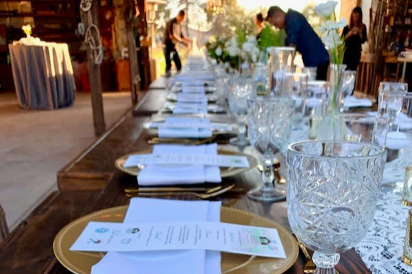 Fine dining dinner table set up for group set up in rustic bar