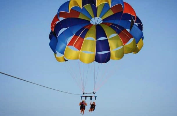 Couple parasailing in Grand Bend