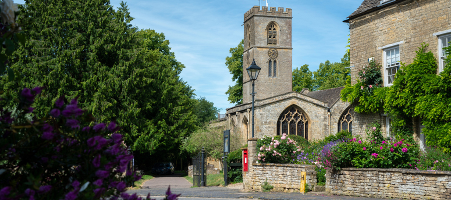 The Church with a blue sky backdrop in Charlbury