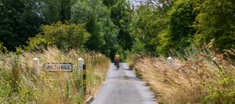 Asthall countryside with cyclist