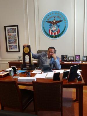 Mayor holding NCAA Volleyball Trophy