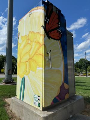 Rocio Arvizu Painting for Green Light Project representing the annual events in Dunwoody, such as the Daffodil Project, Butterfly Experience, Lemonade Days, and Easter Eggstravaganza