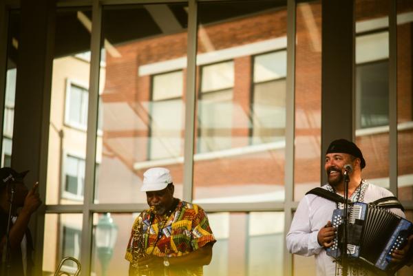 Musicians perform on stage at Miller Park