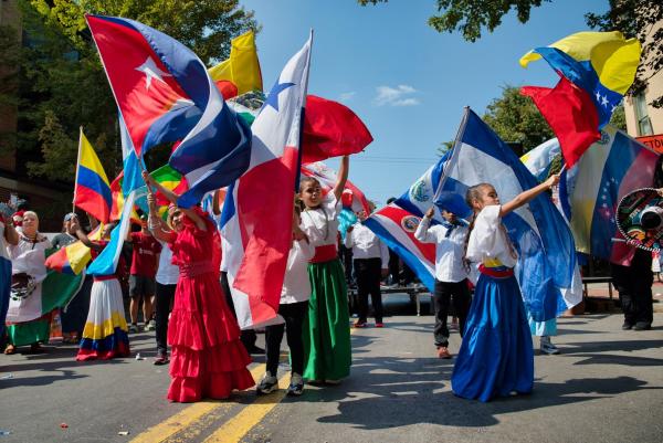 Children holding flags from various Latin countries at Hispanic Heritage Festival in Harrisburg, PA