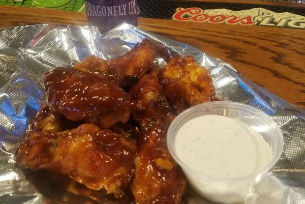Get your wings by the pound (or the 1/2 pound for those with smaller appetites) at Dawg House Pizza in Monrovia, and don't forget the Indiana craft beer to go with them!