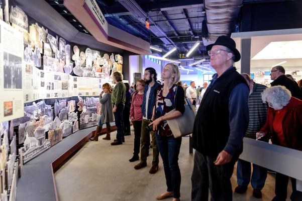 Guests explore the historical timeline at the Houston Museum of Natural Science at Sugar Land
