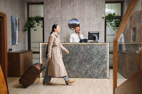 Business woman walking in hotel