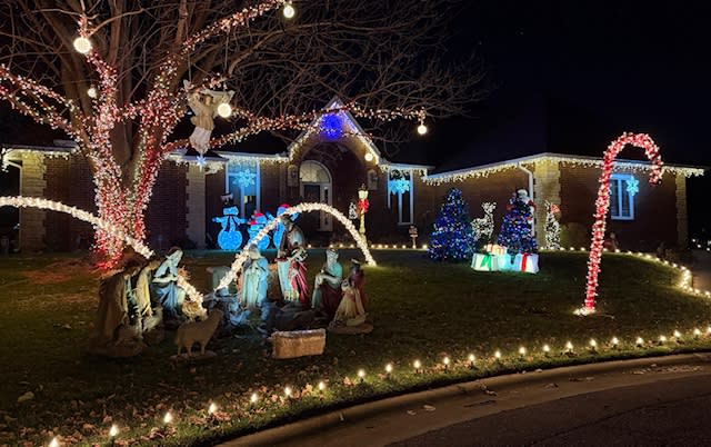 Lights and a nativity scene decorate a home on High Point Circle in Wichita, KS
