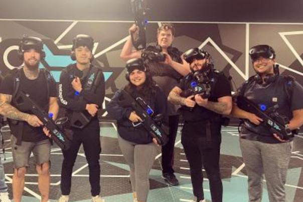 A small group playing a virtual reality game