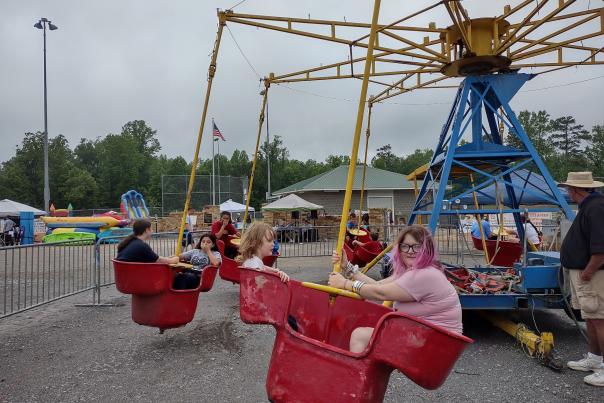 Kids enjoying the carnival ride at Arley day.