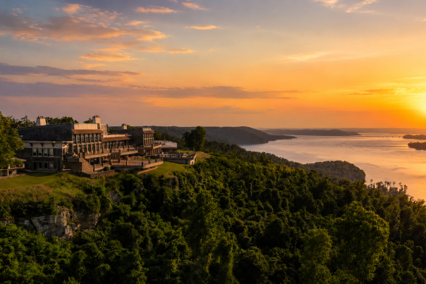 sunset at lake guntersville state park overlooking the lake with the lodge on the bluff