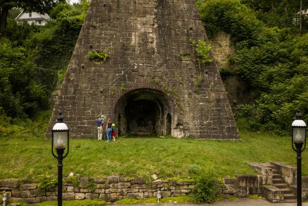 Family reading signage at Iron Furnace - Lonaconing MD