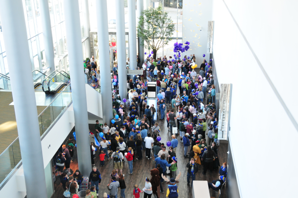 Event participants fill the lobby of the Dena'ina Center