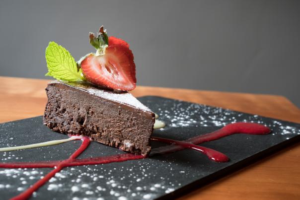 A slice of chocolate cake from Ginger