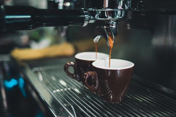 An espresso machine creating espresso shots
