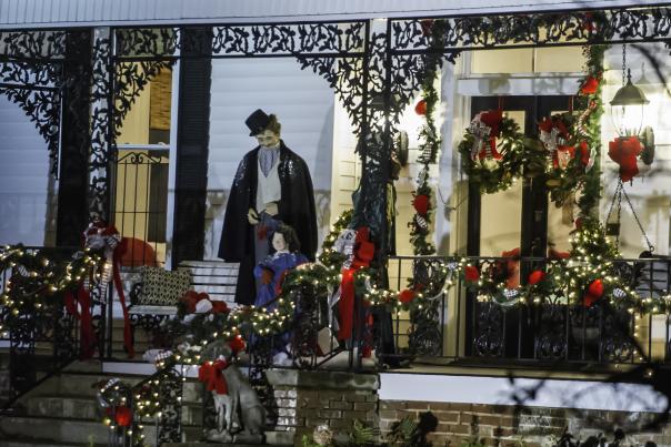 Mr. and Mrs Clause on front porch