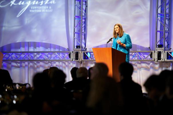 Lady Speaker at a Meeting