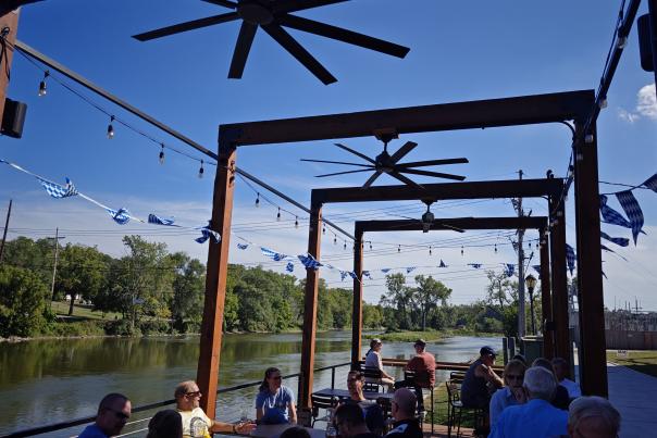 The riverfront patio at Sturdy Shelter Brewing in Batavia, Illinois, during Oktoberfest 2026