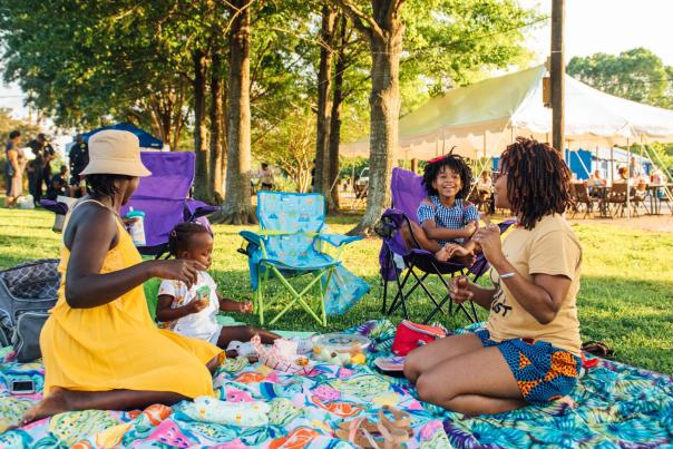 women with children at Levitt AMP music series