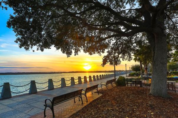 Sunset with sea grass, wooden piers, and estuary in Beaufort County, South Carolina