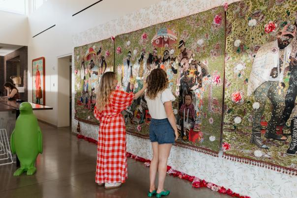 People looking through the art at the 21C