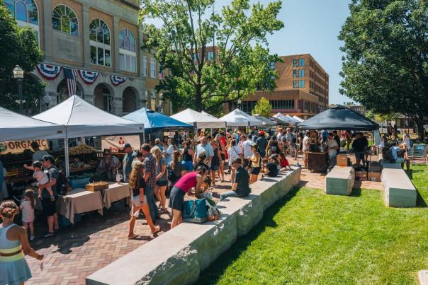 entonville's Farmers Market on our city square, with vendors along our newly opened A Street Promenade.