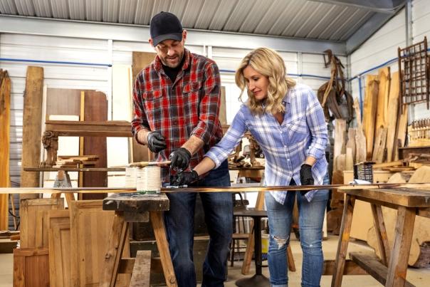 Jenny and Dave Marrs, start of HGTV's Fixer to Fabulous,  in a wood-working shop