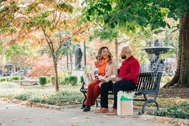 A couple enjoying coffee in Fountain Square Park