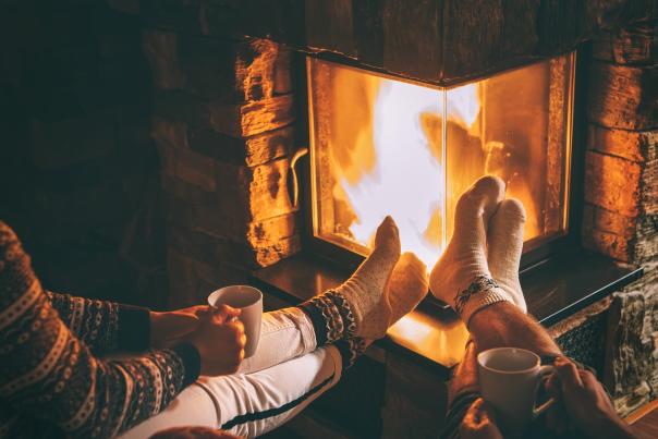 Couple by a fire