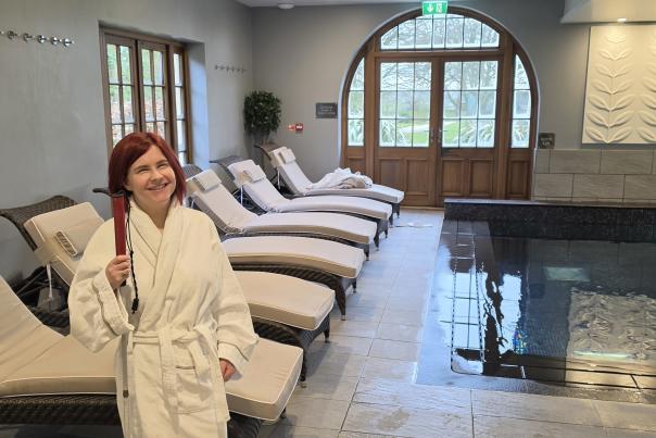 Sassy standing in the Elan Spa in a robe, at Mallory Court Hotel and Spa