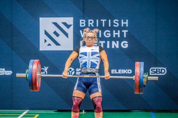 Woman lifting weights during the British Weightlifting Championship