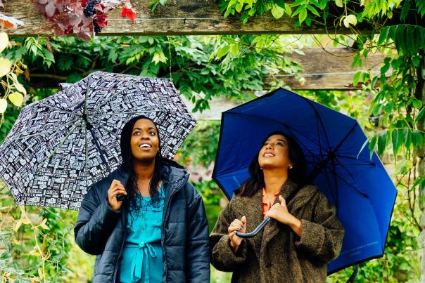 Two ladies with umbrellas