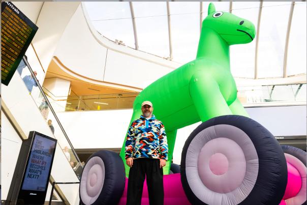 Bruce Asbestos in front on his inflatable sculpture 'Faster Horse'