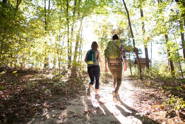 Two people hiking at Monroe Lake