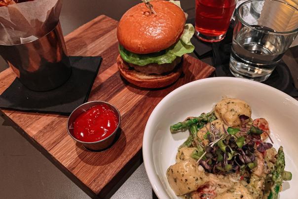A hamburger and a gnudi plate from C3