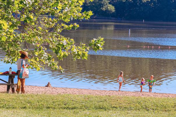 Woman and three kids at the Lake Lemon beach