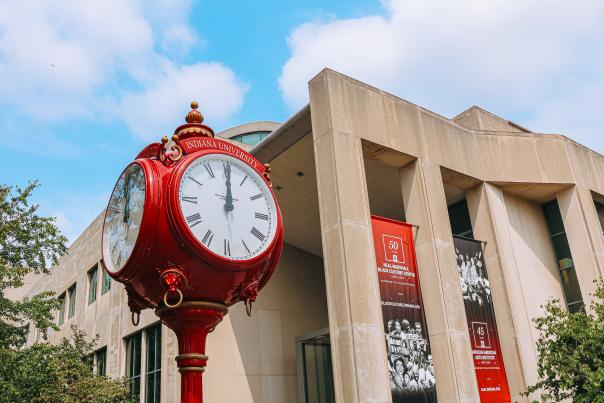 A red clock tower on IU's campus