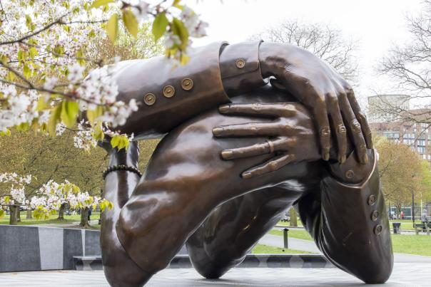 Embrace Ideas Monument and spring blossoms