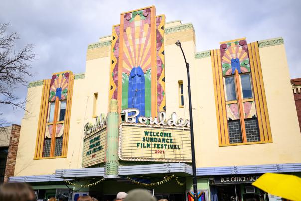The marquee of the Boulder Theater in art deco style with a sign that reads Welcome Sundance Film Festival 2027