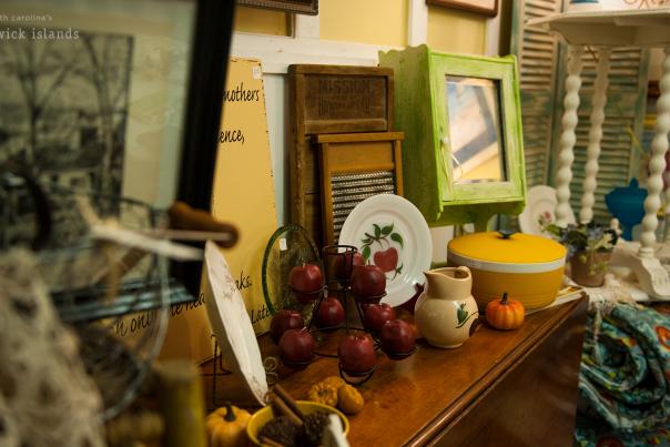 a shelf with antique kitchen and home decor items for sale in shallotte, nc