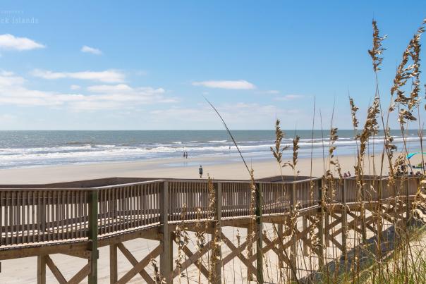 a wooden ramp leading to the beach at 40th Street on Sunset Beach, NC