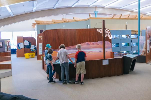 Family and child at an Science Zone exhibit in Casper, WY