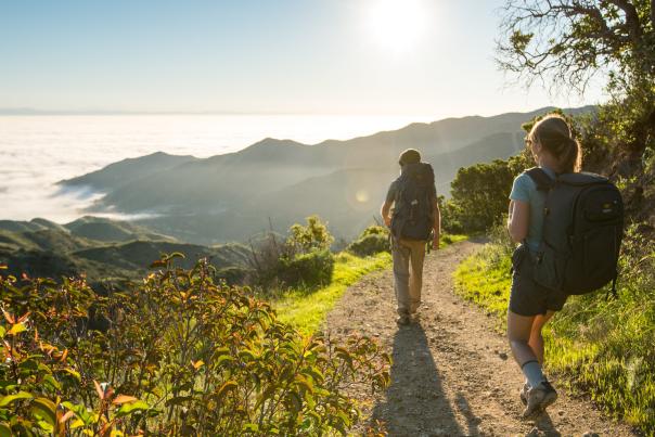 Backpackers on the Trans-Catalina Trail taking in the mountain and ocean views