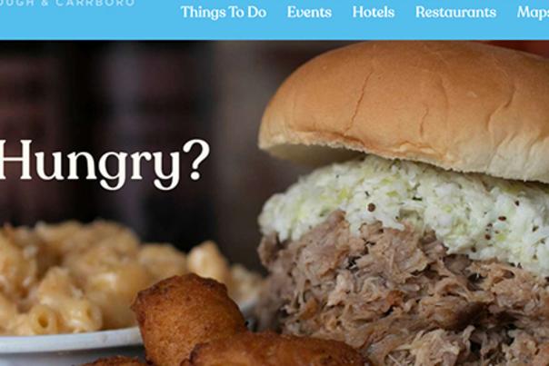 VisitChapelHill homepage features AudioEye Icon