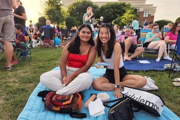 Friends Enjoying Outdoor Concert at Southern Village