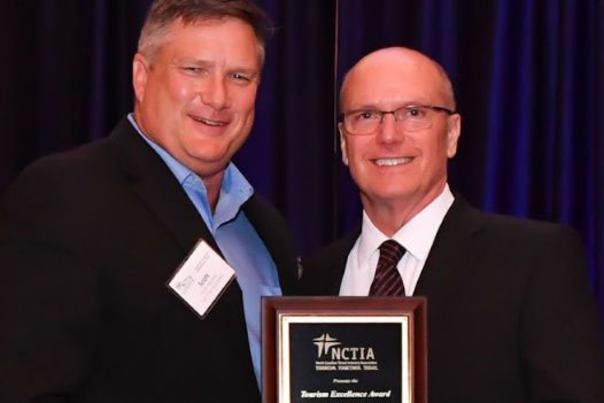 TOPO's Scott Maitland and VisitNC's Mark Shore